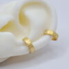 Silikonohr mit zwei Earcuffs "Flimmerns" aus Gold